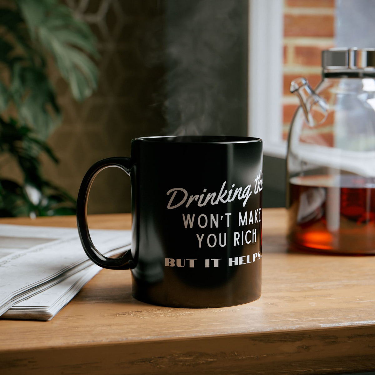 Drinking this won't make you rich. But it helps - Black Mug